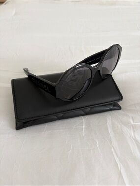 CHANEL Black Oval Acetate Sunglasses
